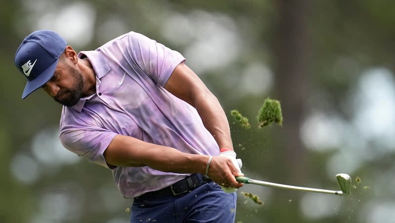 Tony Finau hits his tee shot on the fourth hole during the first round at the Masters at Augusta National Golf Club Thursday, April 11, 2024, in Augusta, Ga.
