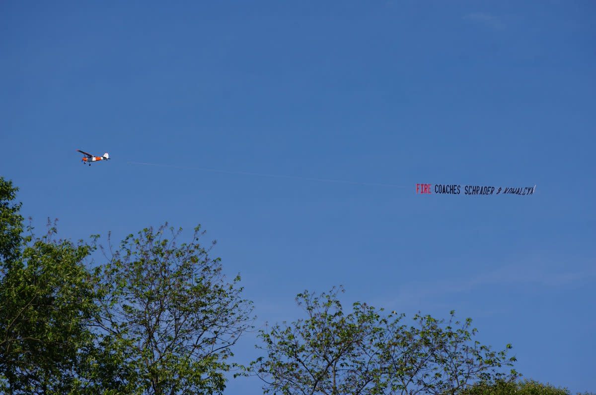 A banner was flown over Briarcliff High School on Monday that called for the school’s two baseball coaches to be fired. (Twitter/@dwm58)