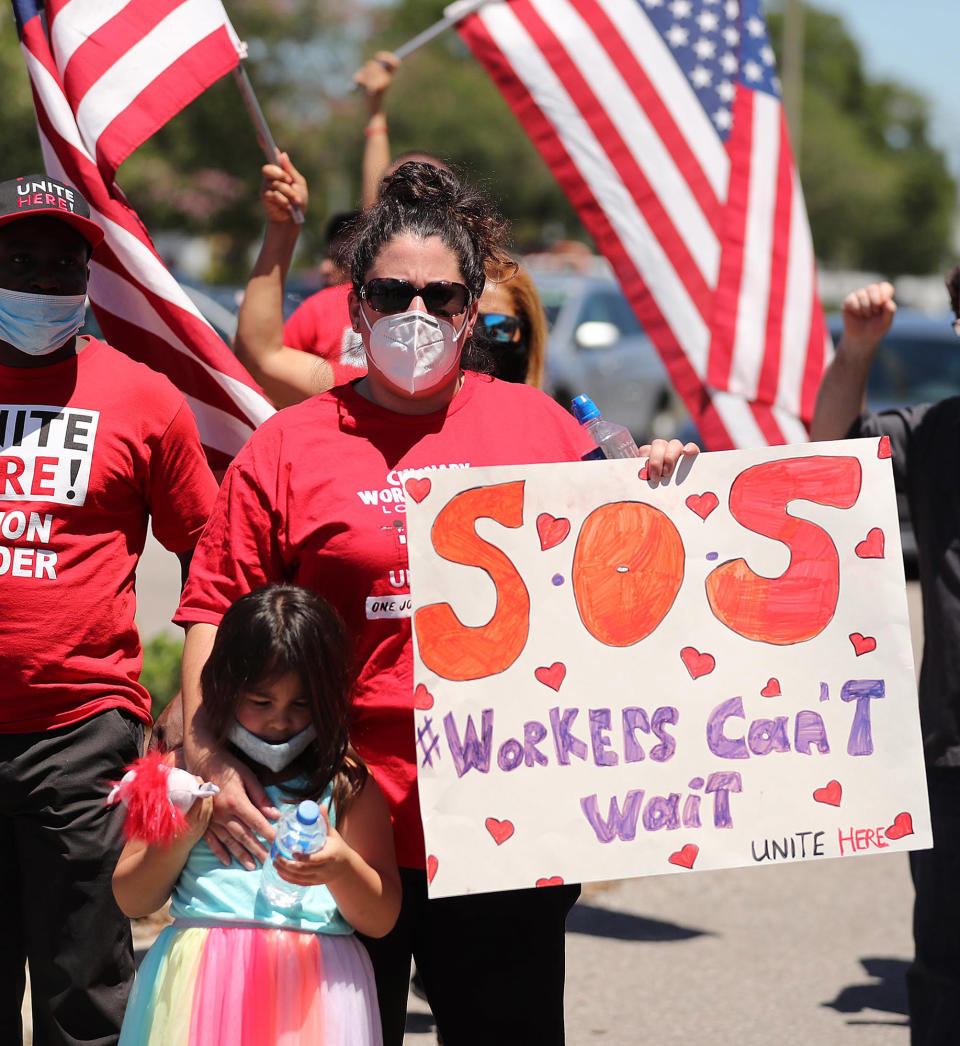 Protestors during an appearance by Florida Gov. Ron DeSantis