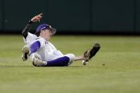 Jun 18, 2018; Omaha, NE, USA; Washington Huskies center fielder Braiden Ward (7) is unable to catch a ball against the Oregon State Beavers in the eighth inning in the College World Series at TD Ameritrade Park. Mandatory Credit: Bruce Thorson-USA TODAY Sports