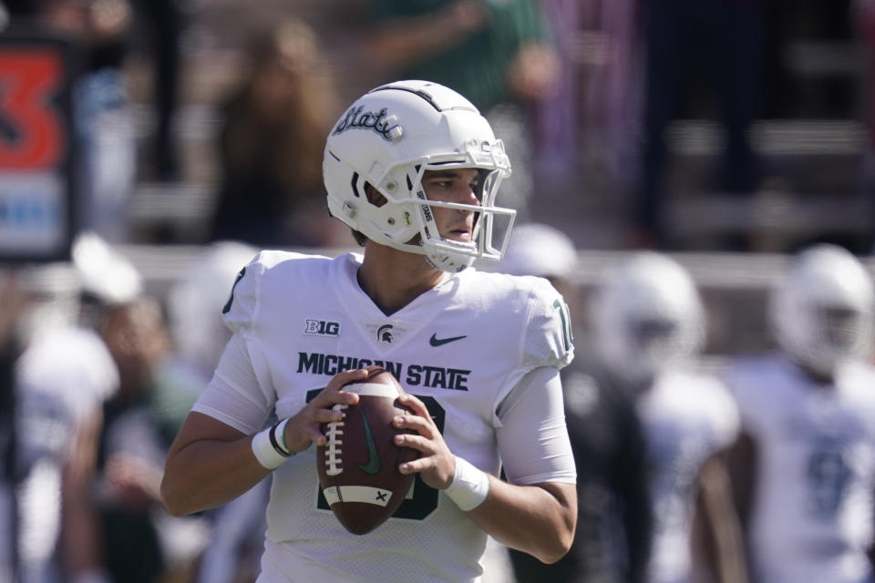 Michigan State quarterback Payton Thorne (10) looks to throw during the first half of an NCAA college football game against Indiana, Saturday, Oct. 16, 2021, in Bloomington, Ind. (AP Photo/Darron Cummings)