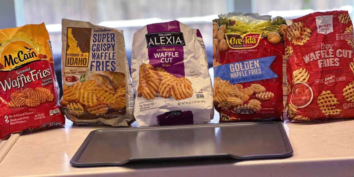 bags of frozen french fries on a table