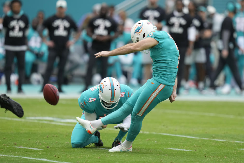 Miami Dolphins place kicker Jason Sanders (7) kicks a field goal as punter Thomas Morstead (4)holds, during the first half of an NFL football game against the New York Jets129, Sunday, Jan. 8, 2023, in Miami Gardens, Fla. (AP Photo/Lynne Sladky)