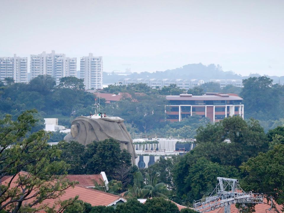 Part of the facade of Capella Hotel is seen in the center of the photo, on Wednesday, June 6, 2018, on Sentosa Island in Singapore.