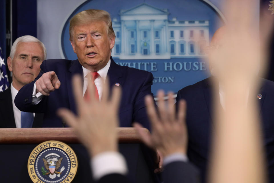 WASHINGTON, DC - FEBRUARY 29:   U.S. President Donald Trump takes questions as Vice President Mike Pence looks on during a news conference at the James Brady Press Briefing Room at the White House February 29, 2020 in Washington, DC. Department of Health in Washington State has reported the first death in the U.S. related to the coronavirus.  (Photo by Alex Wong/Getty Images)