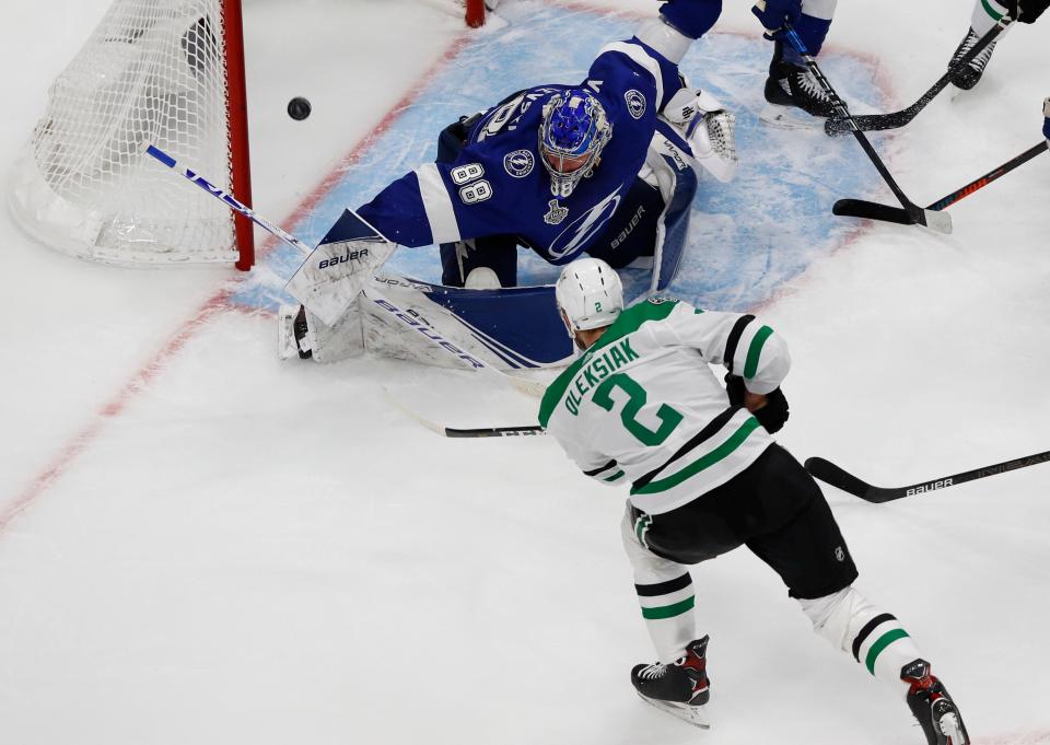 Dallas Stars defenseman Jamie Oleksiak (2) scores a goal past Tampa Bay Lightning goaltender Andrei Vasilevskiy (88) during the second period.