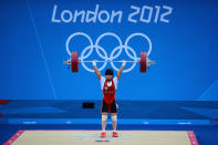 Zulfiya Chinshanlo of Kazakhstan sets a world and Olympic record as she competes in the Women's 53kg Weightlifting on Day 2 of the London 2012 Olympic Games at ExCeL on July 29, 2012 in London, England. (Getty Images)