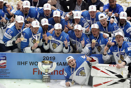 Ice Hockey World Championships - Final - Canada v Finland - Ondrej Nepela Arena, Bratislava, Slovakia - May 26, 2019 Finland's players celebrate after winning the World Championship. REUTERS/Vasily Fedosenko