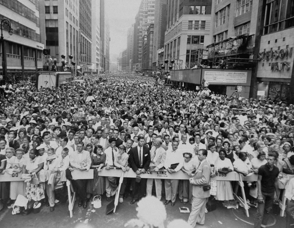 The crowd gathered in Times Square to hear Billy Graham preach, Sept. 3, 1957. (Photo: New York Daily News Archive via Getty Images)