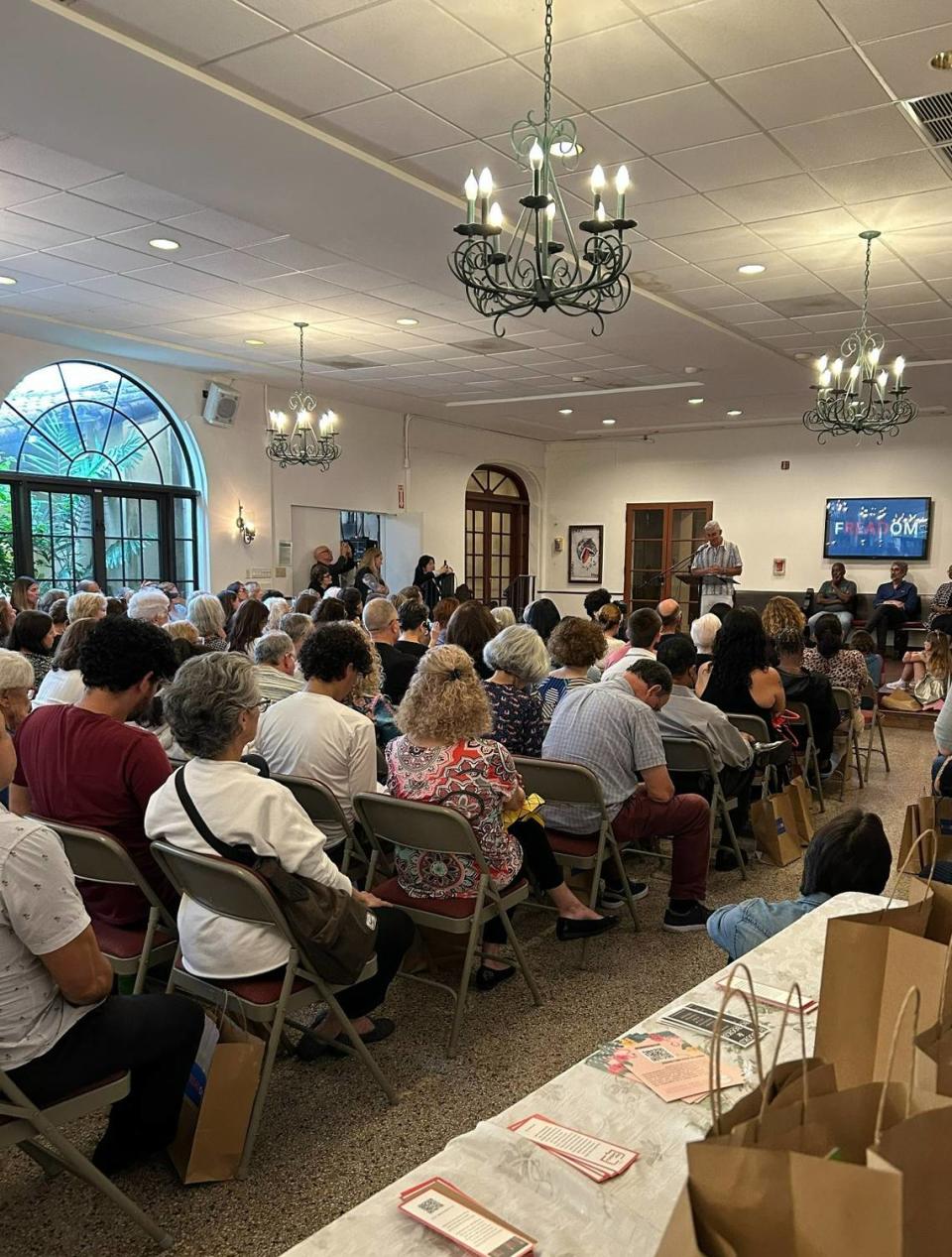 A celebration and book giveaway of the recently challenged books in the Miami-Dade County Public Schools was held on Tuesday, June 6, 2023 at the Sanctuary for Banned Books at Coral Gables Congregational Church. The event drew in about 300 community members, teachers and young children.