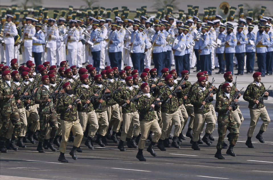 Pakistani commandos from the Special Services Group march during a military parade to mark Pakistan's Republic Day, in Islamabad, Pakistan, Thursday, March 23, 2017. President Mamnoon Hussain said Pakistan is ready to hold talks with India on all issues, including Kashmir, as he opened the annual military parade. During the parade, attended by several thousand people, Pakistan displayed nuclear-capable weapons, tanks, jets, drones and other weapons systems. (AP Photo/Anjum Naveed)