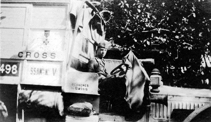 Paul Handy Moore driving his ambulance in WWI. Throughout his time of service, Moore took many photographs which have now been enlarged and included in book,  “Brancordier” along with the journal entries.