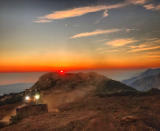 <p>A dozer from the Santa Barbara County Fire Department clears a fire break across a canyon from atop Camino Cielo down to Gibraltar to make a stand should the fire move in that direction, Wednesday, Dec. 13, 2017, in the Santa Ynez Mountains area of Santa Barbara, Calif. (Photo: Mike Eliason/Santa Barbara County Fire Department via AP) </p>