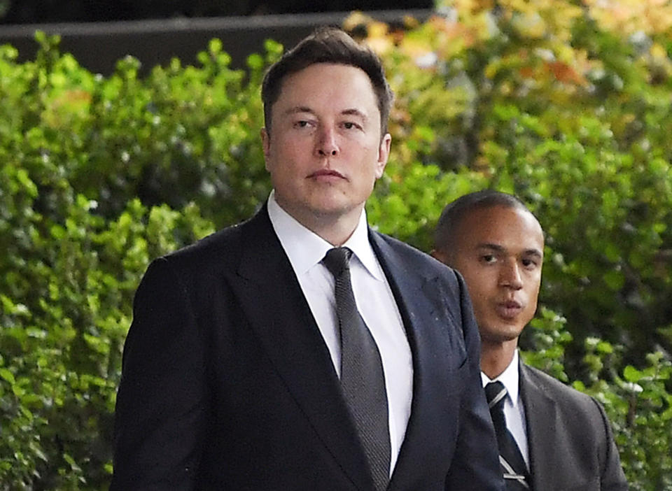 FILE - In this Wednesday, Dec. 4, 2019 file photo, Tesla CEO Elon Musk arrives at U.S. District Court in Los Angeles. Musk did not defame a British cave explorer when he called him “pedo guy” in an angry tweet, a Los Angeles jury found Friday, Dec. 6, 2019. (AP Photo/Mark J. Terrill, File)