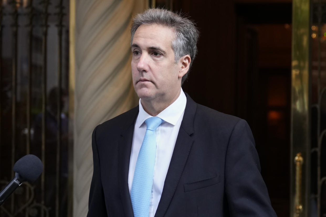 Michael Cohen leaves his apartment building on his way to Manhattan criminal court.