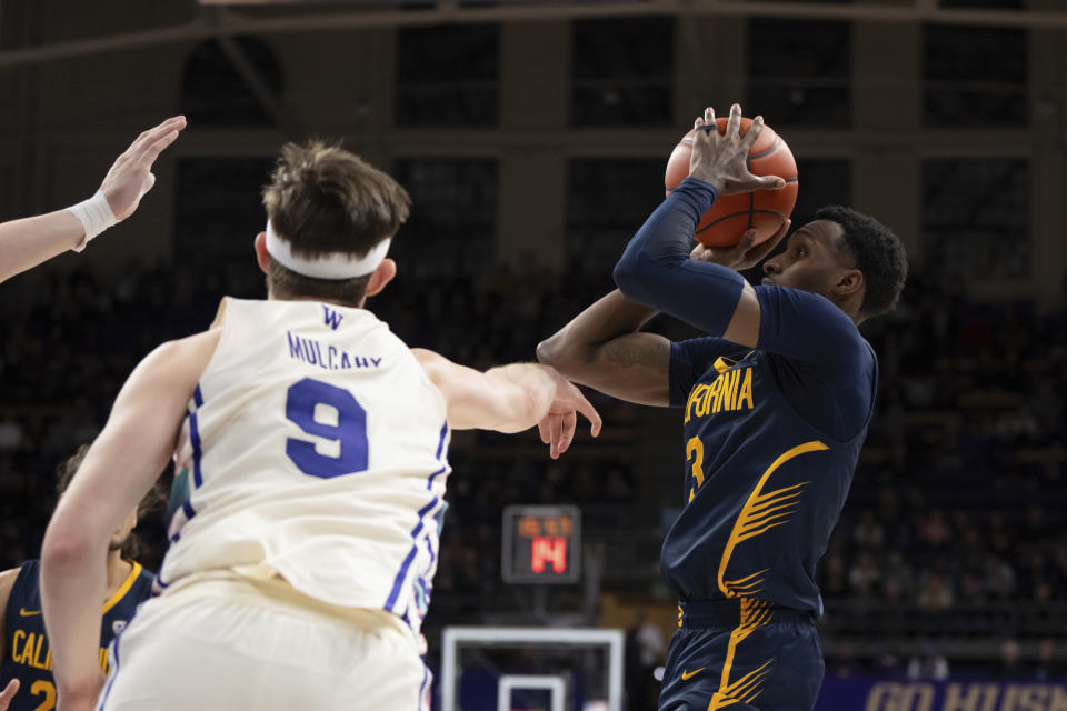 California guard Keonte Kennedy shoots against Washington guard Paul Mulcahy during the second half of an NCAA college basketball game Saturday, Feb. 17, 2024, in Seattle. California won 82-80. (AP Photo/Stephen Brashear)