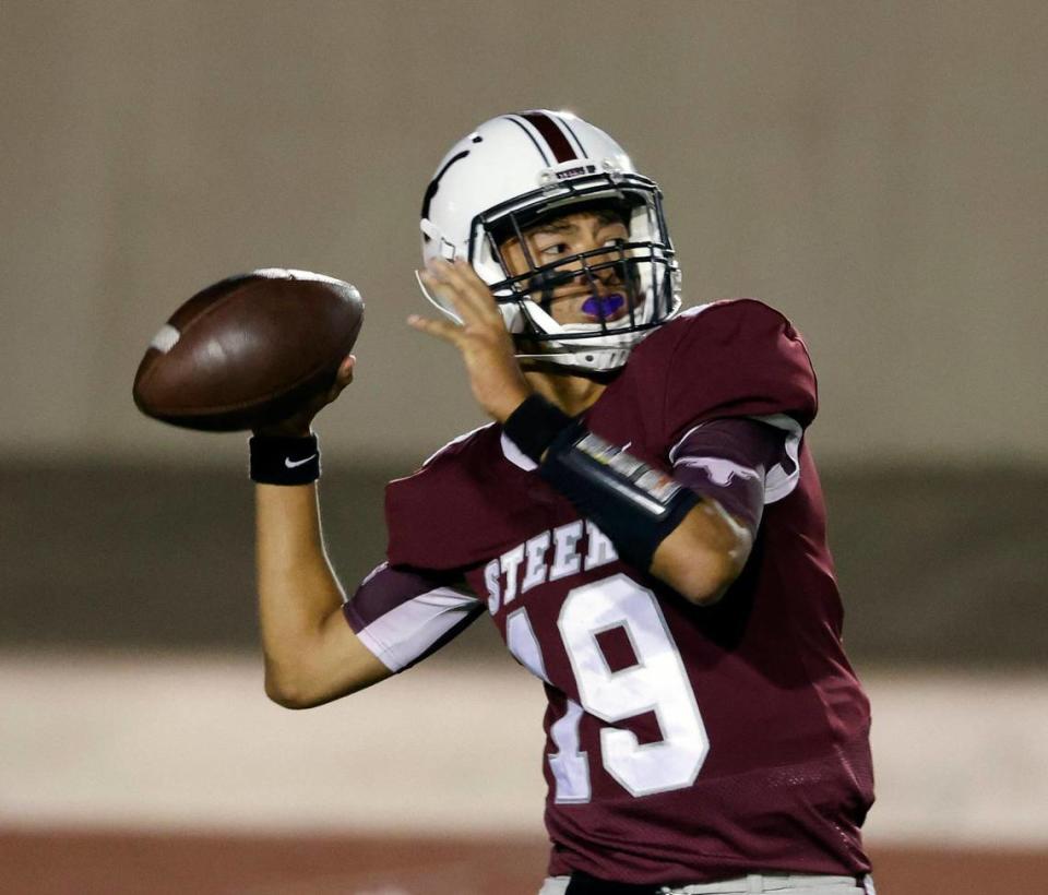 North Side quarterback Angel Valdez (19) tosses a completion down field in the second half of a UIL football game at Farrington Field in Fort Worth, Texas, Friday, Oct. 06, 2023. Wyatt handed North Side a 19-7 defeat on their home coming night. (Special to the Star-Telegram Bob Booth)