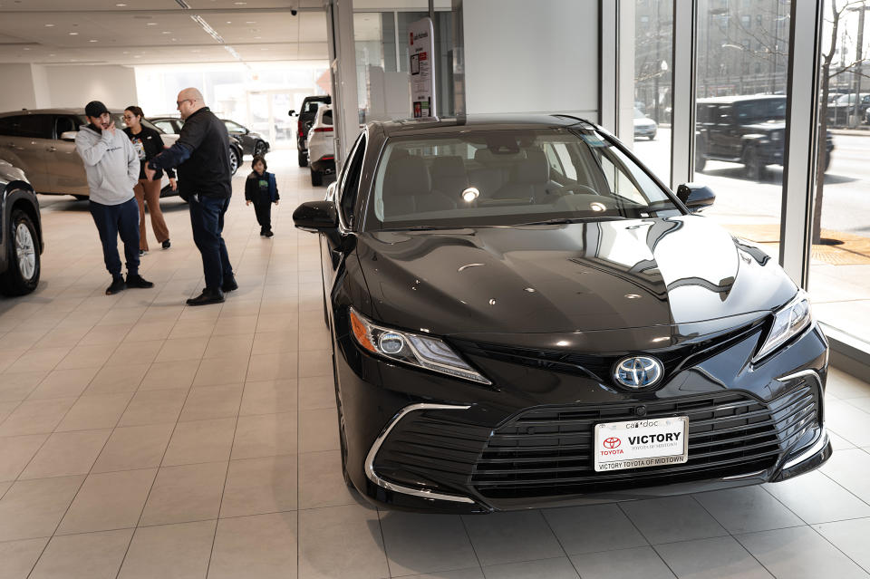 A Toyota Camry hybrid is for sale at a dealership on February 6, 2024, in Chicago, Illinois.  / Credit: Scott Olson of Getty Images