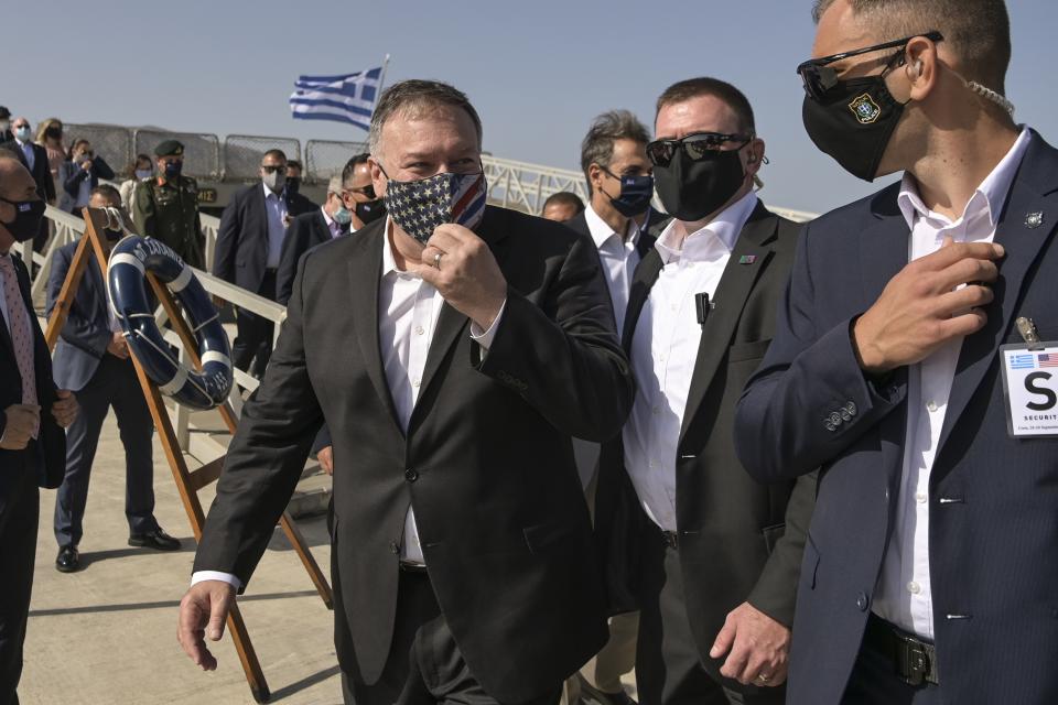 US Secretary of State Mike Pompeo visits the Greek frigate Salamis at the Naval Support Activity base at Souda, on the Greek island of Crete, Tuesday, Sept. 29, 2020. Pompeo visited a U.S. naval base at Souda Bay on the southern Greek island of Crete Tuesday, ahead of a meeting with Greece's prime minister on the second day of his trip to the country. (Aris Messinis/Pool viaAP)