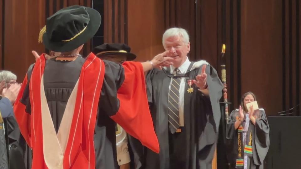 Family friend and deputy provost at Ontario Tech University, Mary Bluechardt, surprised Clark by congratulating him on stage.