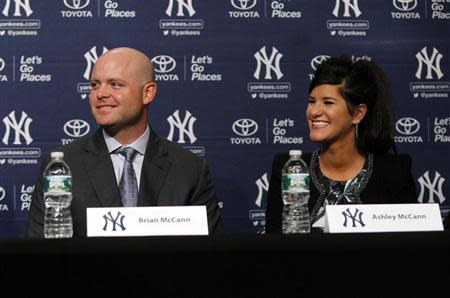 Dec 5, 2013; Bronx, NY, USA; New York Yankees catcher Brian McCann and wife Ashley McCann during press conference at Yankees Stadium. Noah K. Murray-USA TODAY Sports