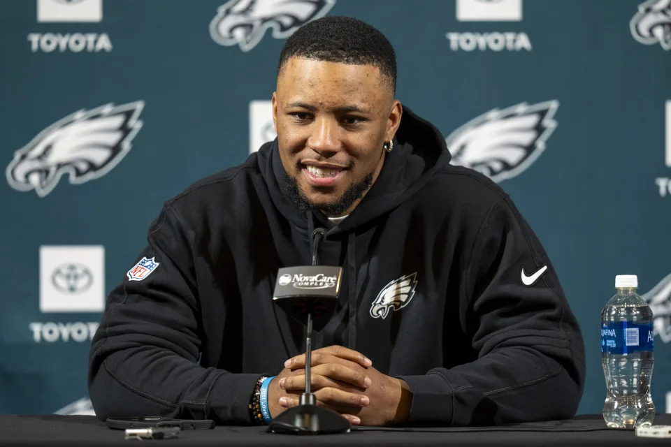 Philadelphia Eagle's Saquon Barkley talks to the media during a press conference after signing with the NFL football team, Thursday, March 14, 2024, in Philadelphia. (AP Photo/Chris Szagola)