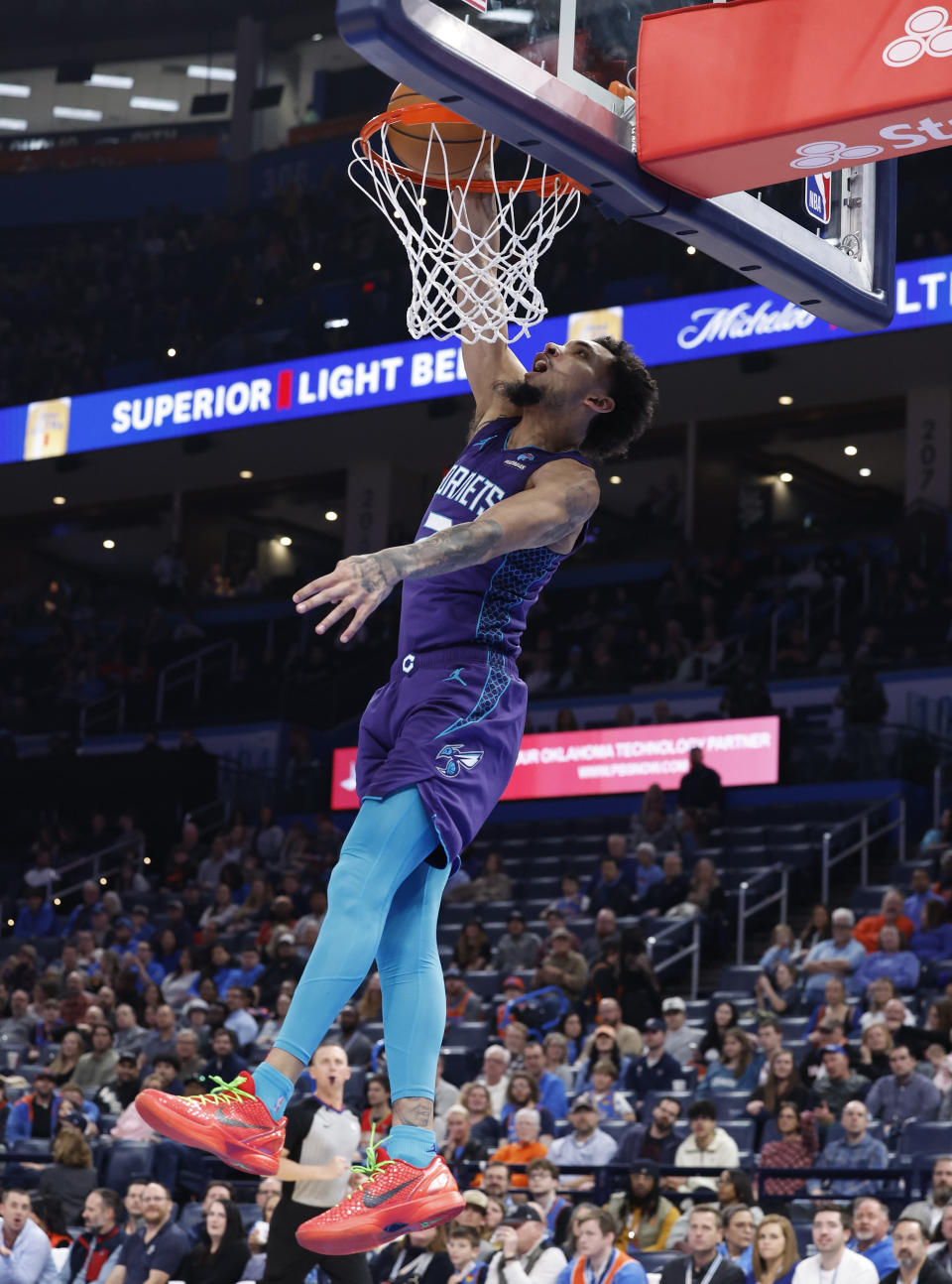 Feb 2, 2024; Oklahoma City, Oklahoma, USA; Charlotte Hornets guard <a class="link " href="https://sports.yahoo.com/nba/players/6553/" data-i13n="sec:content-canvas;subsec:anchor_text;elm:context_link" data-ylk="slk:James Bouknight;sec:content-canvas;subsec:anchor_text;elm:context_link;itc:0">James Bouknight</a> (2) dunks against the Oklahoma City Thunder during the second half at Paycom Center. Mandatory Credit: Alonzo Adams-USA TODAY Sports