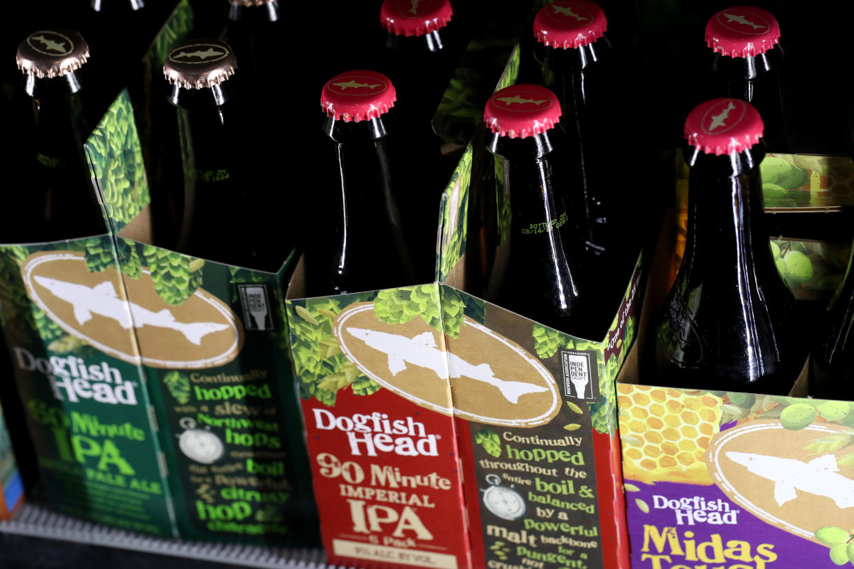 SAN FRANCISCO, CALIFORNIA - MAY 10: Bottles of Dogfish Head Brewing beers are displayed on a shelf at Ales Unlimited on May 10, 2019 in San Francisco, California. Boston Beer Company, the second largest craft brewer in the United States and the maker of Samuel Adams beer, announced plans to buy Delaware based Dogfish Head brewing for $300 million. (Photo by Justin Sullivan/Getty Images)