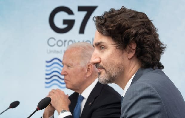 Canadian Prime Minister Justin Trudeau, right, and U.S. President Joe Biden spoke about China on the margins of the G7 summit on Saturday, senior Canadian and U.S. administration officials said. (The Canadian Press - image credit)