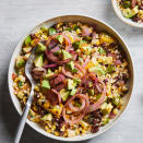 <p>Southwestern flavors star in this potluck-perfect salad. <a href="https://www.eatingwell.com/recipe/248296/grilled-corn-salad-with-black-beans-rice/" rel="nofollow noopener" target="_blank" data-ylk="slk:View Recipe;elm:context_link;itc:0;sec:content-canvas" class="link ">View Recipe</a></p>
