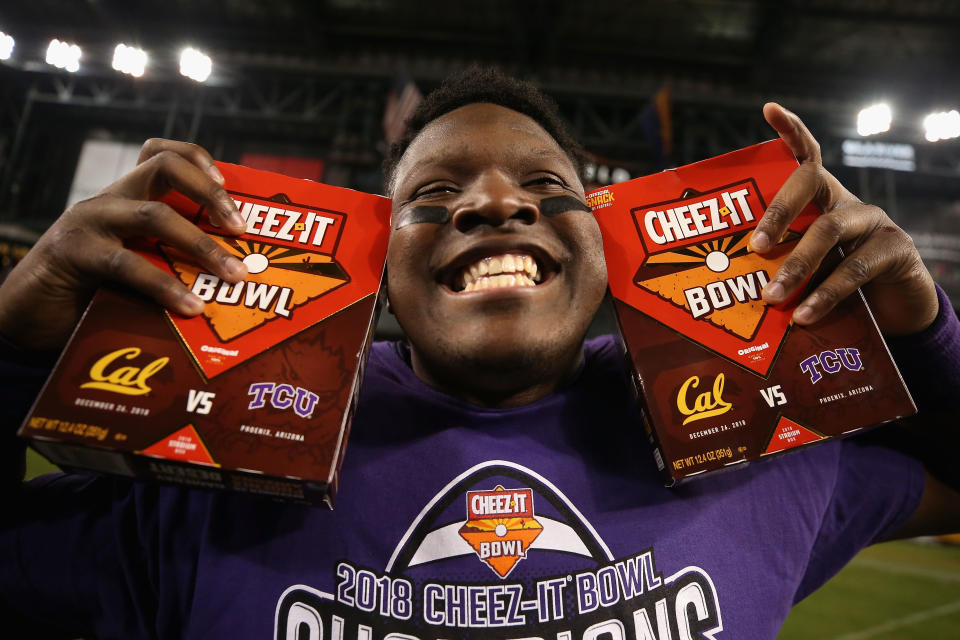PHOENIX, ARIZONA - DECEMBER 26:  Tight end Artayvious Lynn #88 of the TCU Horned Frogs celebrates following the Cheez-it Bowl at Chase Field on December 26, 2018 in Phoenix, Arizona. The Horned Frogs defeated the Golden Bears 10-7 in overtime. (Photo by Christian Petersen/Getty Images)