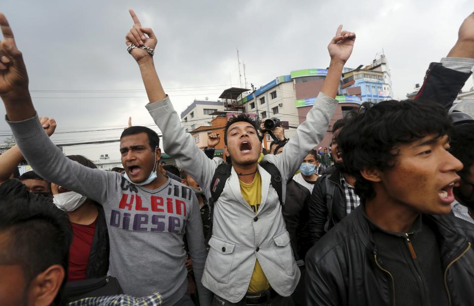 Earthquake victims shout anti-government slogans while protesting against the government's lack of aid provided to the victims in Kathmandu, Nepal April 29, 2015. REUTERS/Adnan Abidi