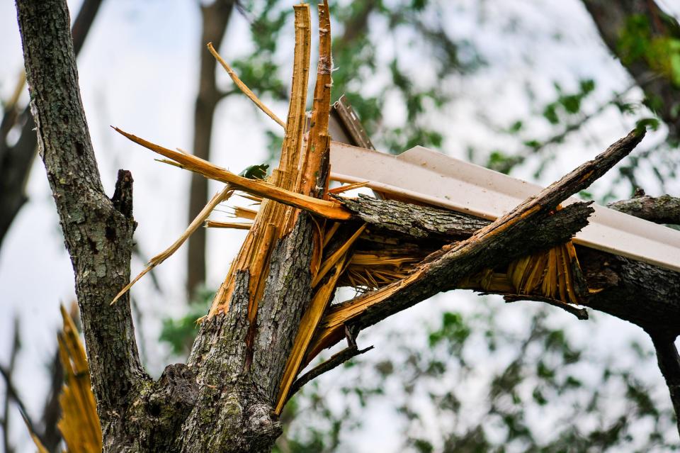 Houses and businesses in Trotwood were damage by tornadoes late Monday night, May 27. Many streets were blocked for downed trees, power lines and debris scattered through the neighborhoods. These homes were on Mount Olive Court. WHIO File