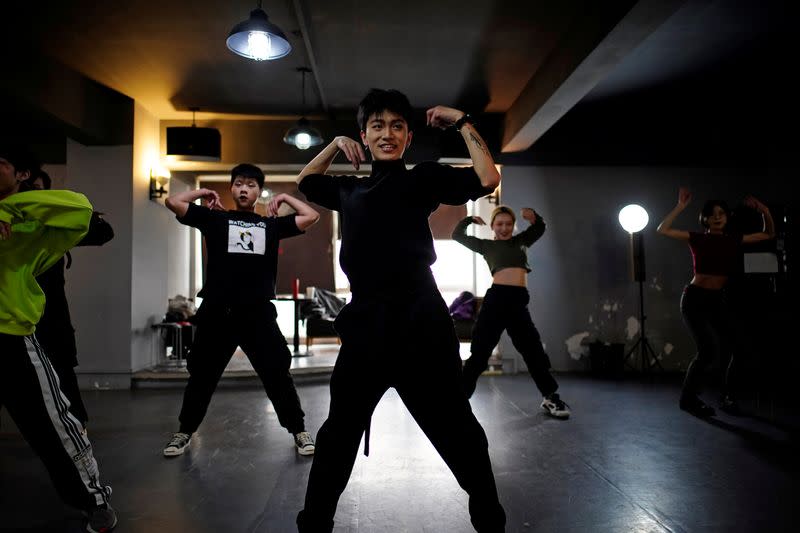 A year after COVID-19 outbreak, Wuhan's vogue dancers find new freedom