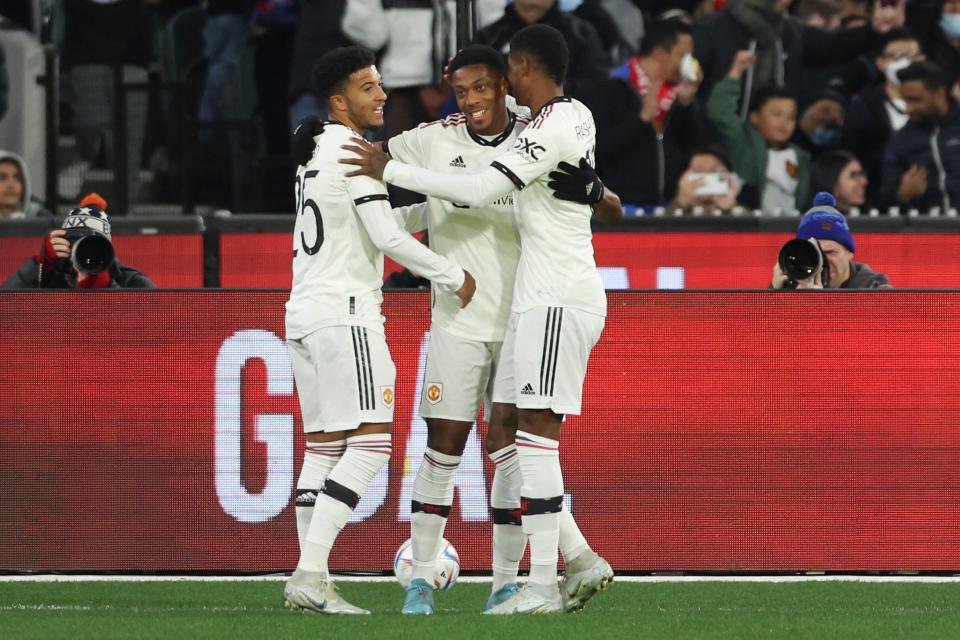 Martial celebrates with Sancho and Rashford (AP)