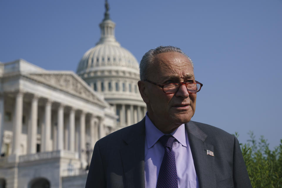 Senate Majority Leader Chuck Schumer, D-N.Y., arrives to meet with Speaker of the House Nancy Pelosi, D-Calif., before an event to promote investments in clean jobs, at the Capitol in Washington, Wednesday, July 28, 2021. (AP Photo/J. Scott Applewhite)