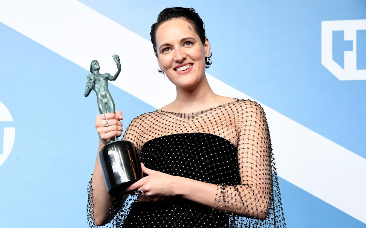  Phoebe Waller-Bridge poses with trophy for best performance by a female actor in a comedy series for her role in Fleabag - FilmMagic, Inc