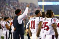 <p>Duane Brown #76 of the Houston Texans raises his fist during the national anthem before the game against the New England Patriots at Gillette Stadium on September 22, 2016 in Foxboro, Massachusetts. (Photo by Adam Glanzman/Getty Images) </p>