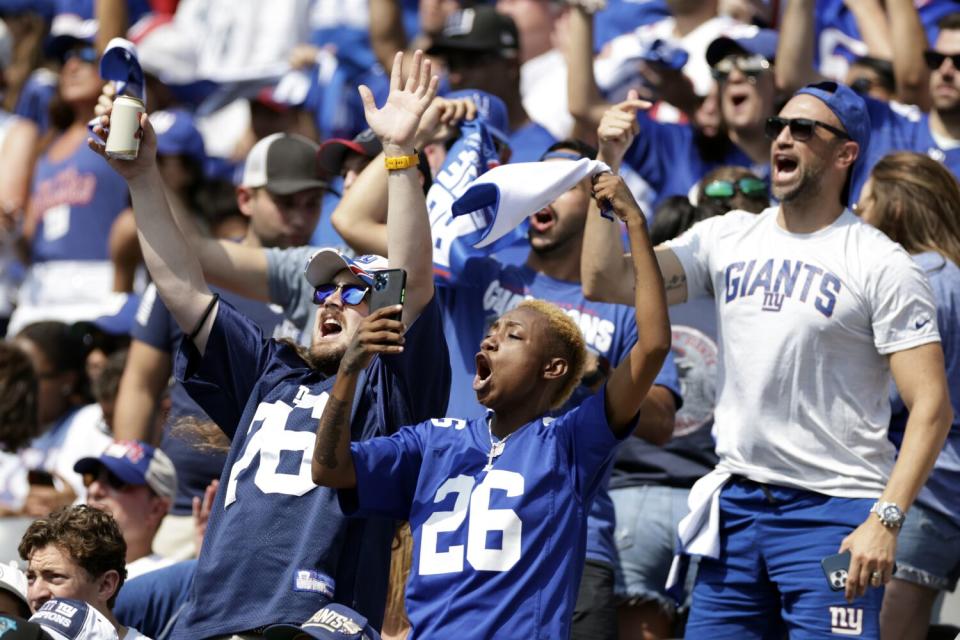 New York Giants fans cheer against the Carolina Panthers.