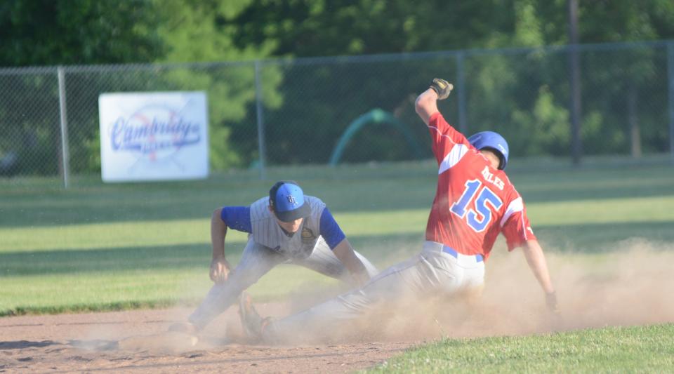 Cambridge Post 84's Cohen Miles (15) slides into second base as Beverly-Lowell Post 389/750 shortstop Easton Eibel applies the tag during Wednesday's season opening  American Legion matchup at Don Coss Stadium.