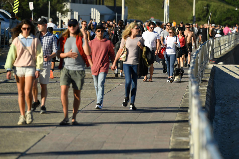 Large crowds in Bondi on Sunday. Few people wearing masks.