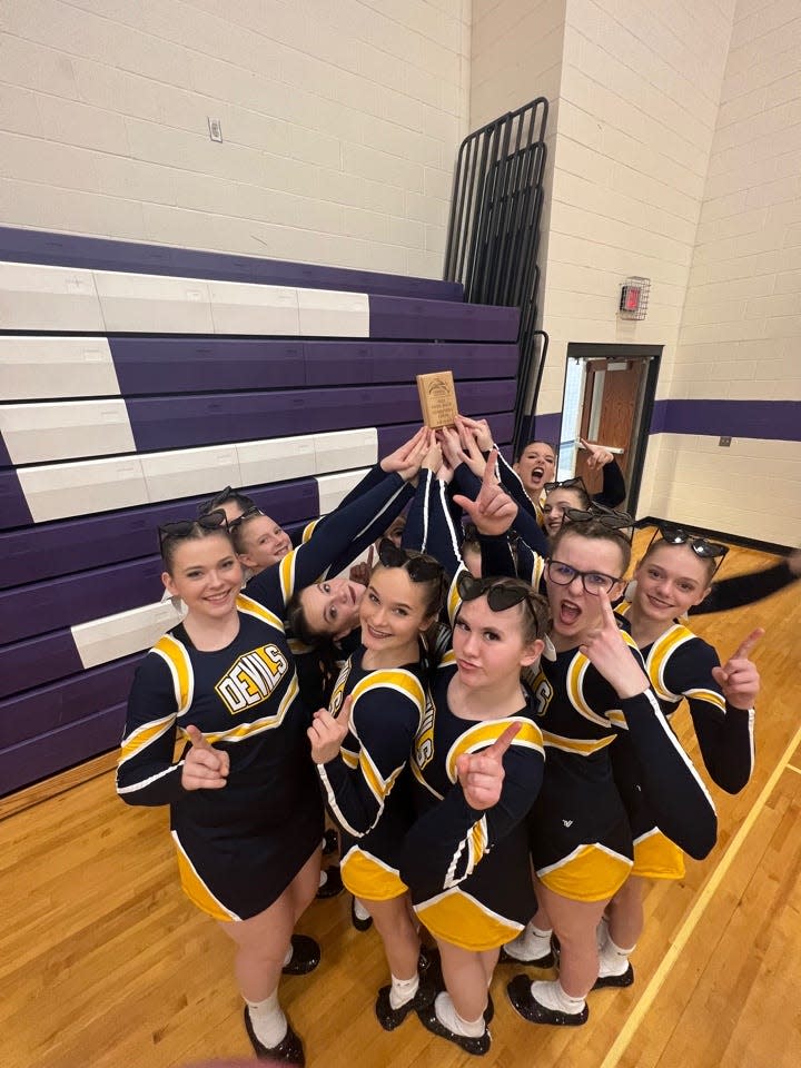 The Gaylord competitive cheer team celebrates after winning the Farwell Invitational over the weekend.