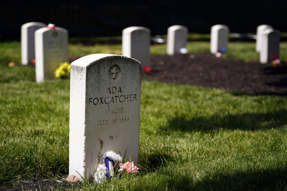A headstone is seen at the cemetery of the U.S. Army's Carlisle Barracks, Friday, June 10, 2022, in Carlisle, Pa. The Army is continuing a multi-phase project to disinter the remains of indigenous children who died more than a century ago while attending a government-run boarding school at the site and reunite them with their families. (AP Photo/Matt Slocum)