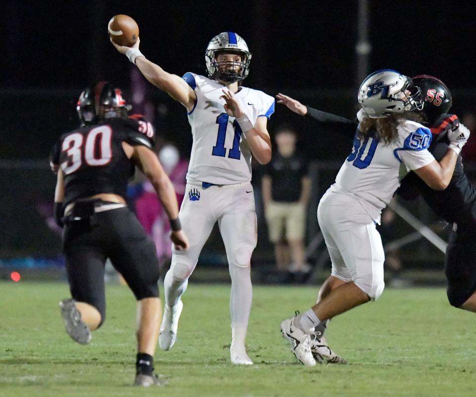 Bartram Trail's Riley Trujillo (11) launches a pass during first half action. The Creekside High School football team hosted Bartram Trail at their Knights Lane campus Friday night, October 14, 2022. Trujillo is committed to UCF.