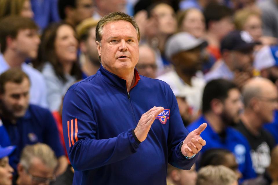 Kansas head coach Bill Self applauds his team&#39;s play against Texas Tech during the first half of an NCAA college basketball game in Lawrence, Kan., Tuesday, Feb. 28, 2023. (AP Photo/Reed Hoffmann)