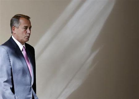 U.S. Speaker of the House John Boehner walks to his weekly news conference on Capitol Hill in Washington, February 6, 2014. REUTERS/Larry Downing