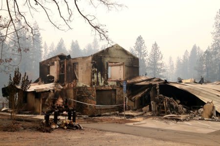 A building destroyed by the Camp Fire is seen in Paradise, California, U.S., November 13, 2018.  REUTERS/Terray Sylvester