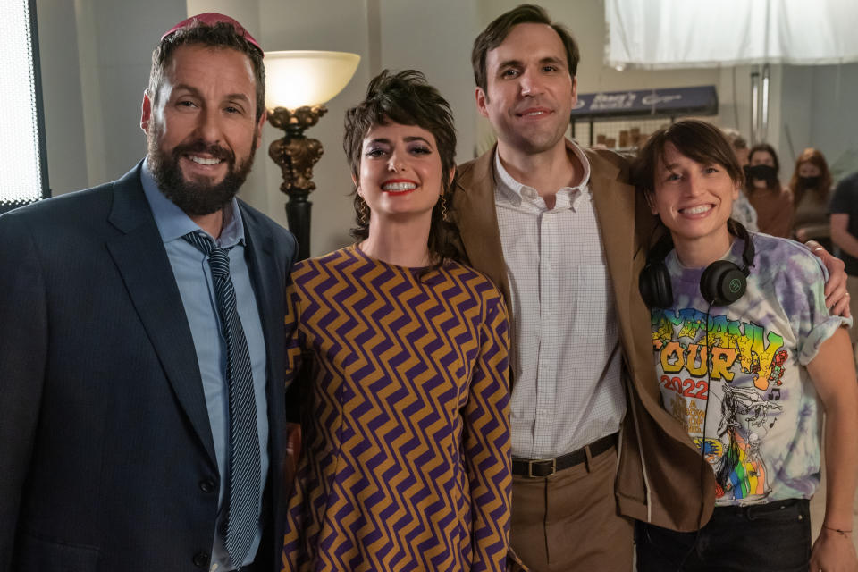 (L to R) Writer/Producer Adam Sandler as Danny Friedman and Sarah Sherman as Rabbi Rebecca, Dan Bulla as Cantor Jerry and Director Sammi Cohen on the set of You Are SO Not Invited To My Bat Mitzvah. (Scott Yamano/Netflix)