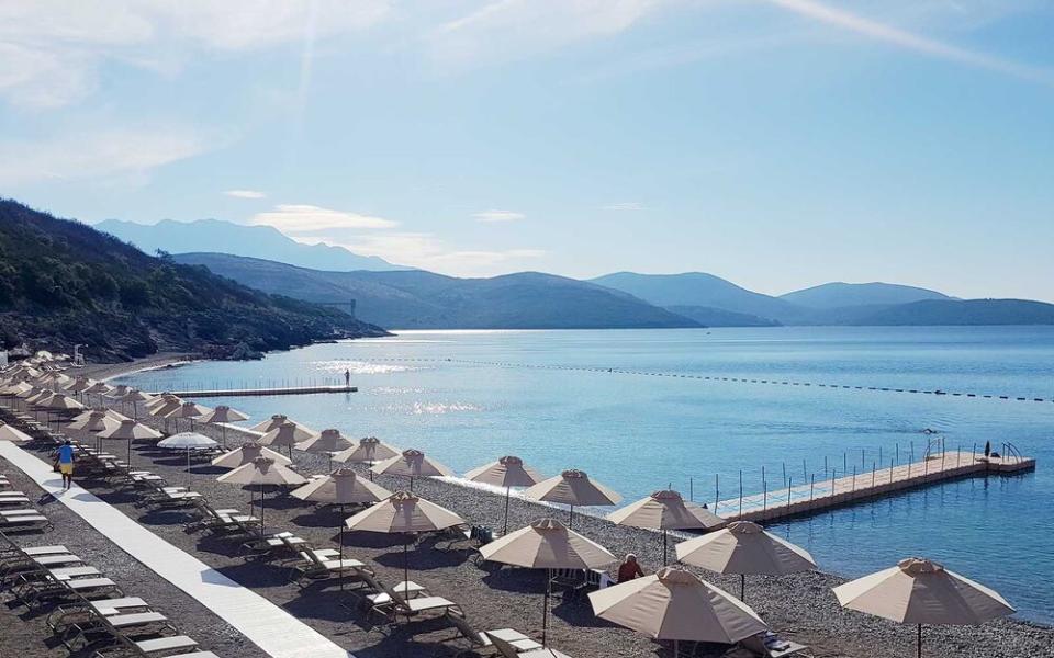 The private beach of the Chedi Luštica Bay, a hotel in Montenegro. | Courtesy of The Chedi Luštica Bay