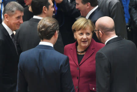 German Chancellor Angela Merkel talks with Austria's Chancellor Sebastian Kurz and Belgium's Prime Minister Charles Michel and Czech Republic's Prime Minister Andrej Babis looks on as they take part in a European Union leaders summit in Brussels, Belgium December 13, 2018. REUTERS/Piroschka van de Wouw/Pool